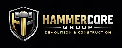 HammerCore Group logo featuring demolition tools and shield design for commercial demolition services.