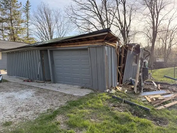 Damaged garage structure removal and demolition services by HammerCore Group.