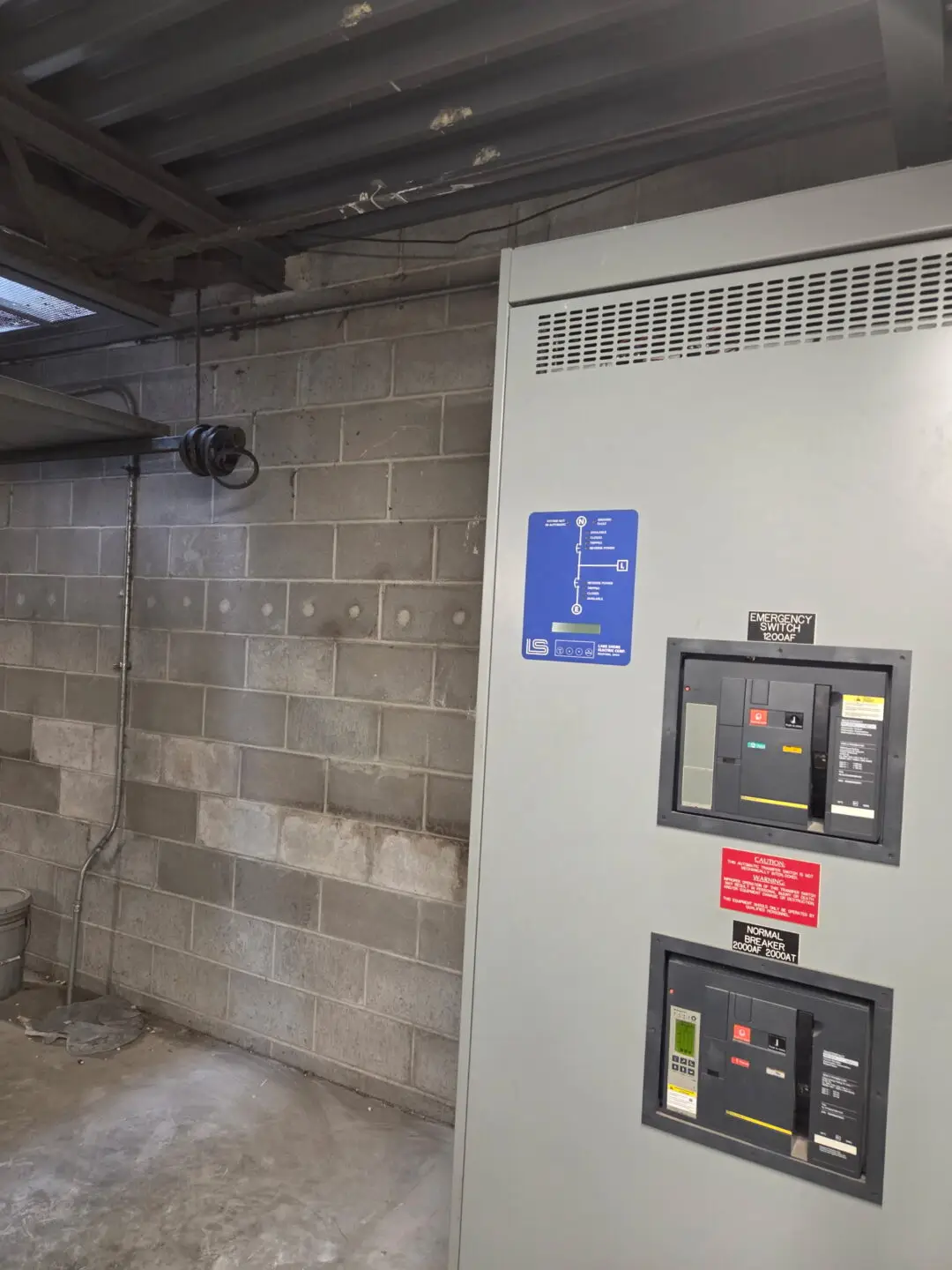 Basement electrical panel and switchgear during demolition and construction project.