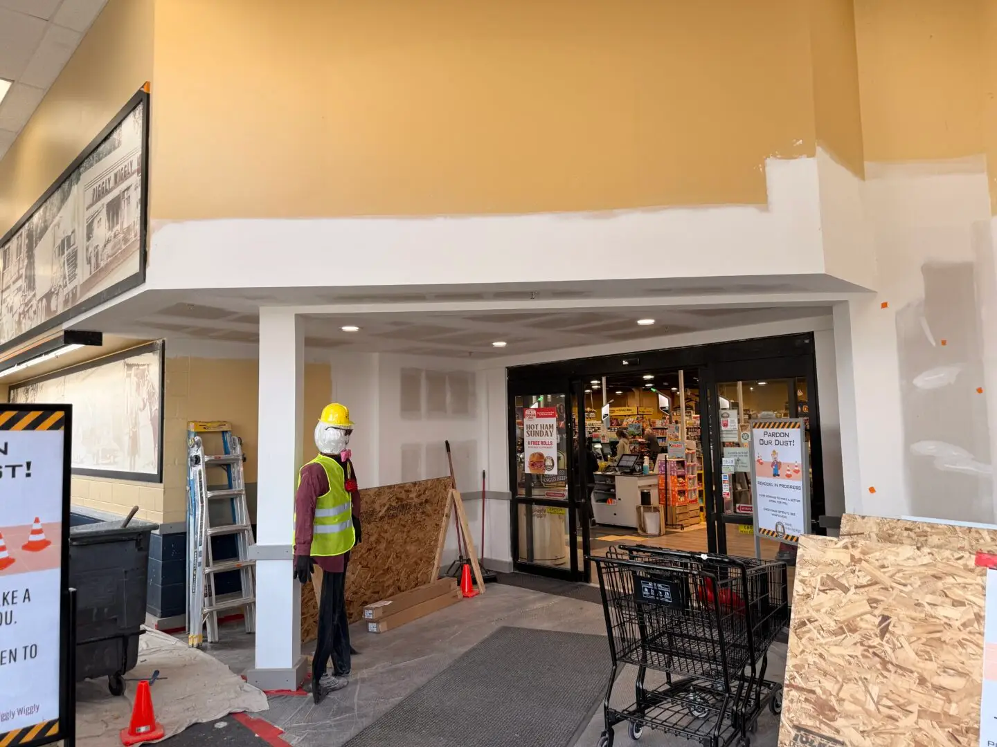 Commercial interior demolition and remodeling project at Piggly Wiggly store, HammerCore Group construction crew.